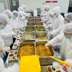 南博会餐饮保障：一份热饭里的“云南味道”
